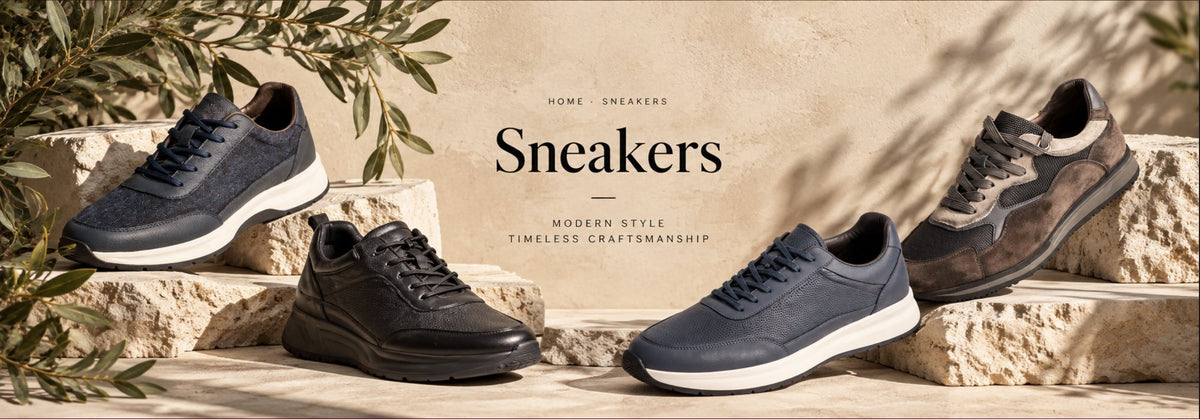 Sneakers collection banner: four men's sneakers on stone steps with olive branches